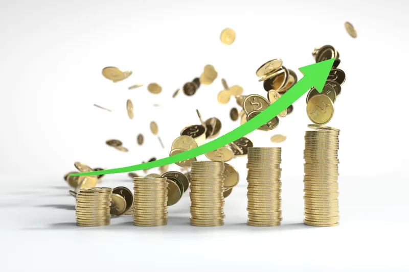 Stacks of coins climbing in steps beneath a rising green arrow